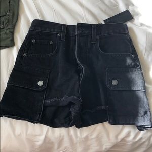 Black jean shorts with pockets on the side